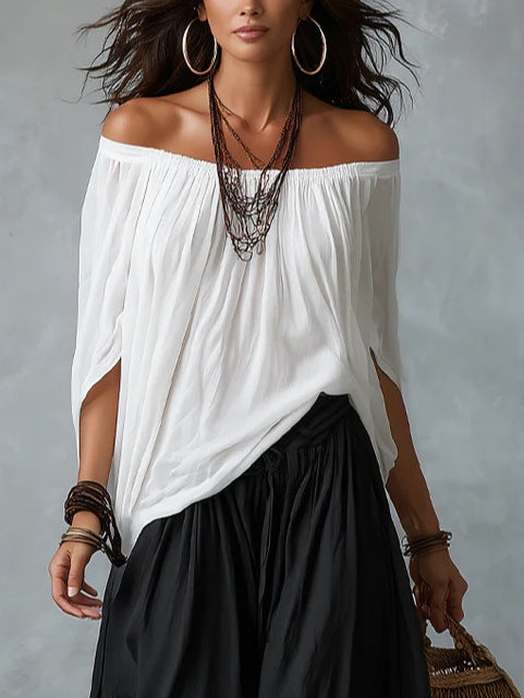 Conjunto de Top Blanco Off-Shoulder y Pantalón Acampanado Estilo Linterna