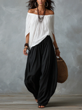 Conjunto de Top Blanco Off-Shoulder y Pantalón Acampanado Estilo Linterna