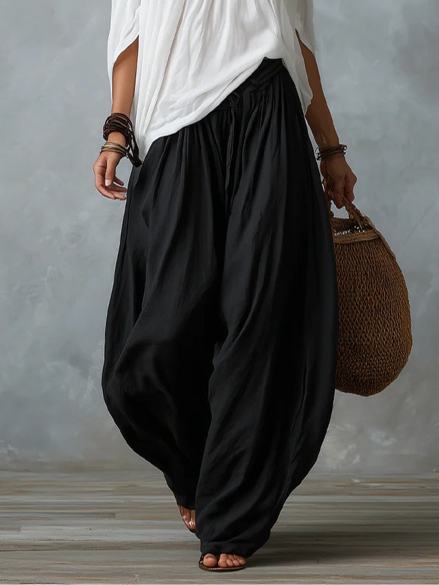 Conjunto de Top Blanco Off-Shoulder y Pantalón Acampanado Estilo Linterna